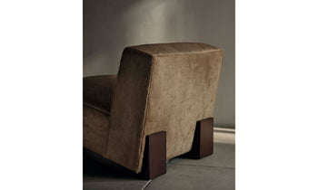 remsen accent chair upholstered in brown pony hair with wooden legs and geometric design - close up back view