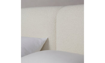 smith bed with upholstered boucle headboard - close up view