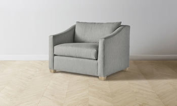 sullivan chair and a half in grey linen with wooden legs - angle view