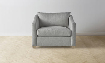 sullivan chair and a half in grey linen with wooden legs - front view