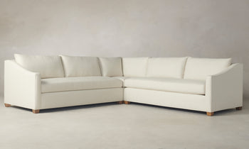 sullivan corner sectional sofa in white melange weave fabric with wooden legs