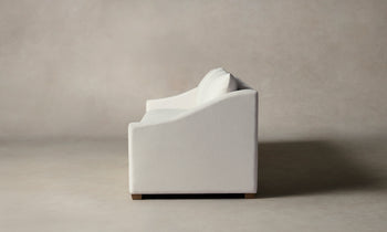 sullivan sleeper sofa in white linen with wooden legs - side view