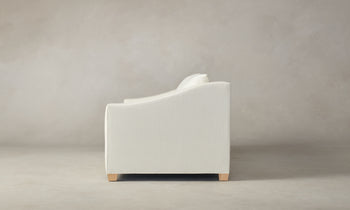 sullivan off-white linen sofa with wooden legs - side view