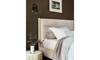 upholstered thompson bed in beige linen with ash wood trim in a bedroom with modern decor