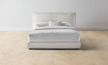 wythe upholstered bed in white linen - front view