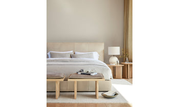 wythe beige upholstered bed in a modern bedroom front view