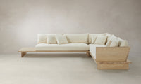 l-shaped sectional in white linen with wooden base and built-in shelf - muir sectional