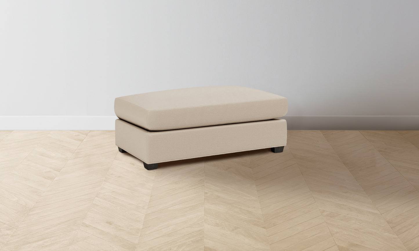 The Sullivan Ottoman - Pebbled Leather Stone