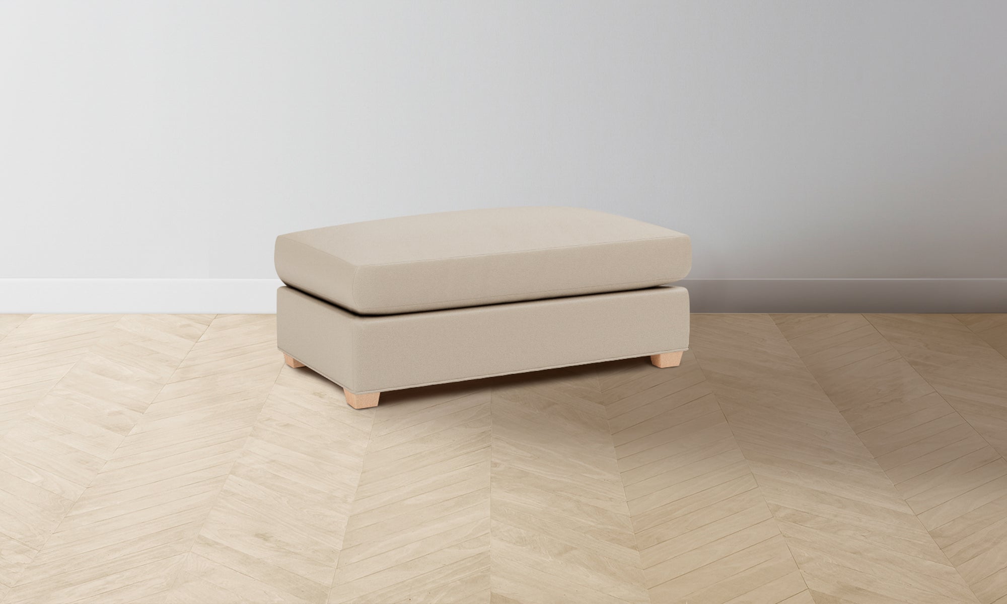 The Sullivan Ottoman - Pebbled Leather Stone