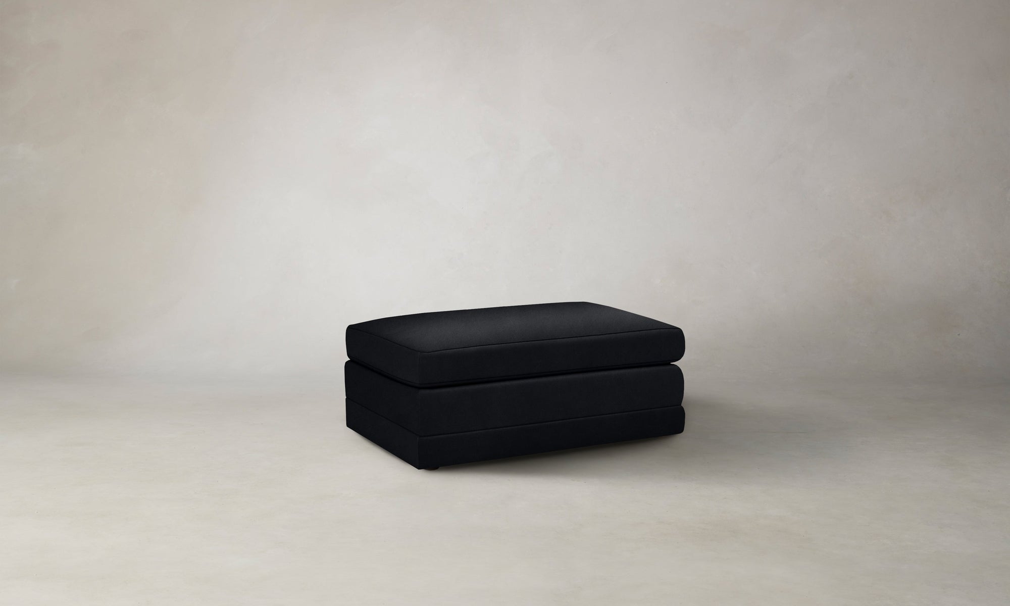 The Warren Ottoman - Costa Leather Jet